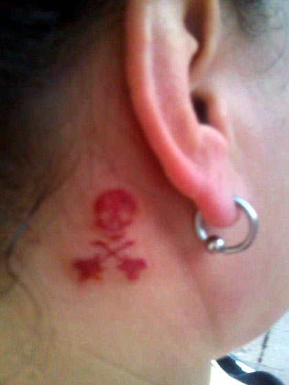 star tattoos behind ear